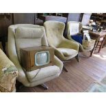 A pair of 1970s swivel armchairs on chromed bases and another swivel armchair (3)