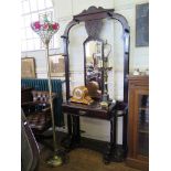 A late Victorian ebonised hall stand, with mirror back, frieze drawer and umbrella stands, 103cm