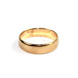 A 9 carat gold wedding ring