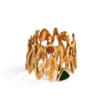 A gem set gold colour metal ring