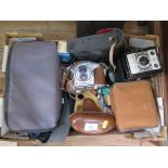 An Afga Flexilette camera, Praktica MTL50 camera and two lenses, a Conway box camera, and other