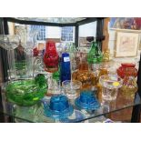 Various glass candleholders and coloured shades, and other glassware