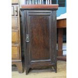 An Edwardian mahogany and satinwood crossbanded bedside cupboard with bowed door, 34cm wide 63cm