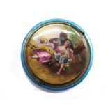 An enamel compact, the lid portraying two young lovers