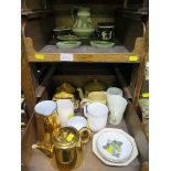 A Wedgwood green jasperware jug, 15cm high, three trinket trays, two black jasperware boxes and a