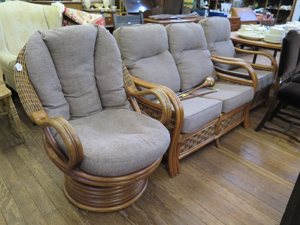 A 'Dresser' conservatory suite, comprising two seat settee, armchair and revolving chair