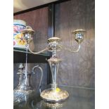 A silver plate two branch candelabra