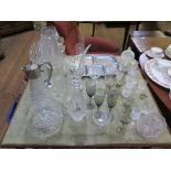 Various glasswares, including smoky glass wine glasses, cut glass vases and stainless steel tray