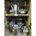 A selection of silver plate including teapots, coffee pots, jugs and sugar bowl (two trays)