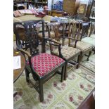 Two George III elm carver dining chairs, with pierced vase shape splats and square legs joined by