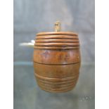 A fruitwood barrel form needle holder, circa 1840, 4.5cm high