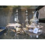 A pair of highly decorated 11" silver plated candlesticks (sconce missing) together with a highly