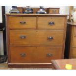 A mahogany chest of drawers, the top with trinket drawers above two short and two long graduated