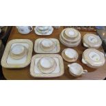 A Bristol dinner service, Academy shape with peach wave pattern border, 32 pieces