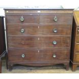 An early 19th century mahogany chest of drawers with two short and three long graduated drawers on