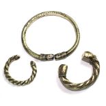 Three Arabian silver colour metal bangles