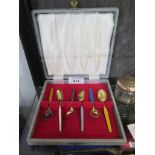 A cased set of six Norwegian silver and enamel coffee spoons
