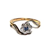 A diamond and sapphire posy ring