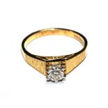 A 9 carat gold single stone ring