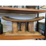 A Japanese wooden hand carved stool