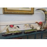 A Juliana Collection resin figure of two greyhounds racing with bibs No 1 and no 6, and another