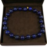 A single row of large lapis lazuli uniform size beads