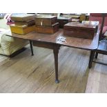 An 18th century mahogany drop leaf table, on turned legs and club feet 121cm wide, and a George