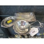 Two silver trays together with a silver tea strainer