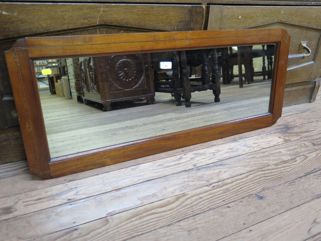 A mahogany framed rectangular wall mirror 103cm x 41cm