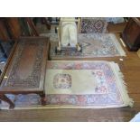 Two Chinese wool rugs 156cm x 71cm and 147cm x 63cm (2)