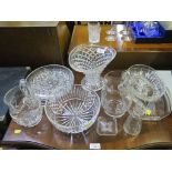 Two cut glass water jugs, two bowls and vase, with an ashtray and two serving trays