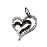A heart shaped diamond pendant