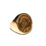 A gold ring set with Pahlavi coin