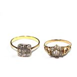 A nine stone diamond ring set in gold colour metal together with a paste set cluster ring (2)