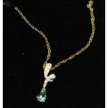 A blue stone pendant on 9 carat gold neck chain