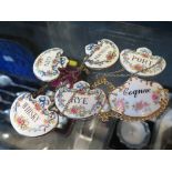 Six various porcelain wine decanter labels - Cognac, Rye, Vermouth, Gin, Whisky and Port