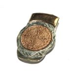 A money clip with Aztec decoration