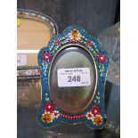 A Small Italian micro mosaic photo frame with inlaid floral decoration and oval aperture, size 7.5cm