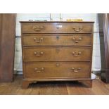 A George III oak chest of drawers, with four long graduated drawers on bracket feet, 91cm wide