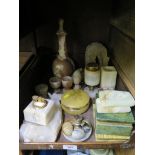 A collection of onyx ornaments, vase, table lighters, egg cups and other stone boxes