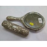 A lady's silver brush and mirror