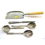 A silver handled letter opener, a scoop, a pair of silver fruit spoons, etc