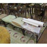 A pair of early 19th century mahogany rail back dining chairs, with square tapering legs joined by