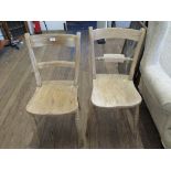 Two beech and elm kitchen chairs with rail backs and turned legs (2)