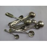 A collection of eleven silver salt and mustard spoons