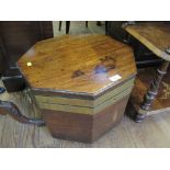 A 19th century brass bound mahogany wine cooler, octagonal on later castors, lacks base, 48cm wide