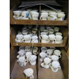 A collection of 128 miniature crested shaving jugs, each with a town or city crest