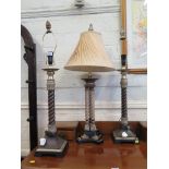 A pair of Italianate crackle finish table lamps with spiral twist columns, 87cm high and another