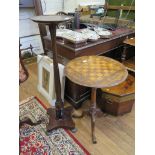 A Victorian walnut chess board inlaid tripod table with fluted turned stem and carved legs, 50cm