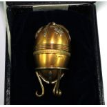 A silver and silver gilt egg from the St James House Company